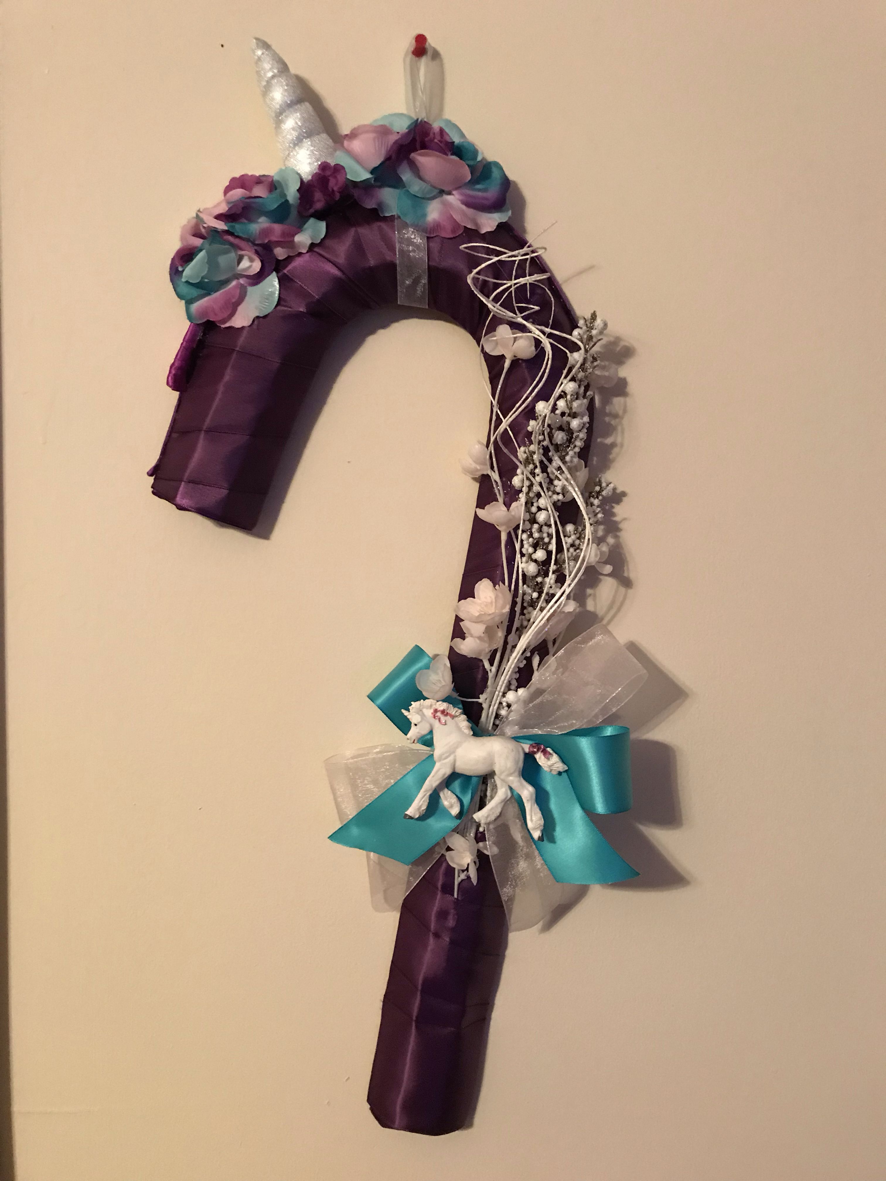 photo Unicorn Candy Cane Wreath diy dollar tree whoville candy cane wreath christmas crafts